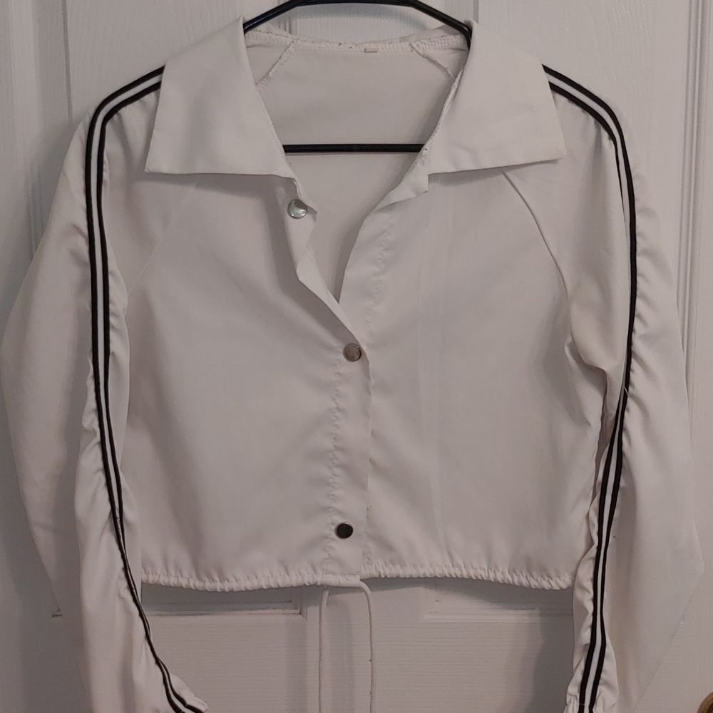 White windbreaker